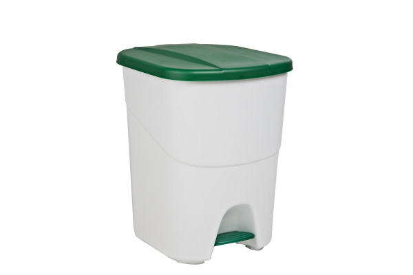 Plastic waste bin with green lid
